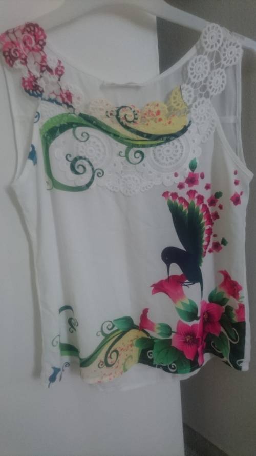 Elegant lace top with bird print