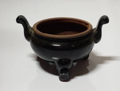A VINTAGE  POT PLANT  VASE HOLDER