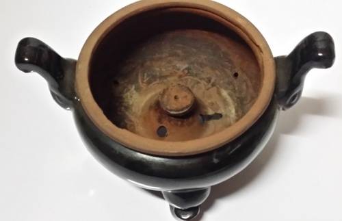 A VINTAGE  POT PLANT  VASE HOLDER