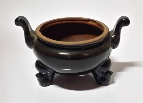 A VINTAGE  POT PLANT  VASE HOLDER