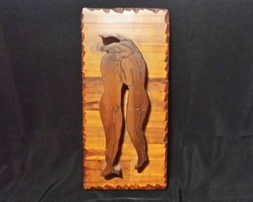 A SOLID WOOD CARVED FIGURINES PLAQUE