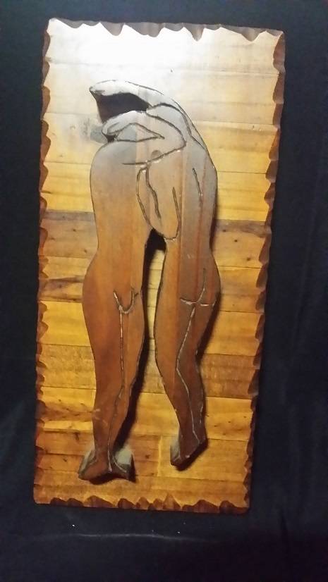 A SOLID WOOD CARVED FIGURINES PLAQUE