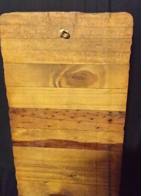 A SOLID WOOD CARVED FIGURINES PLAQUE