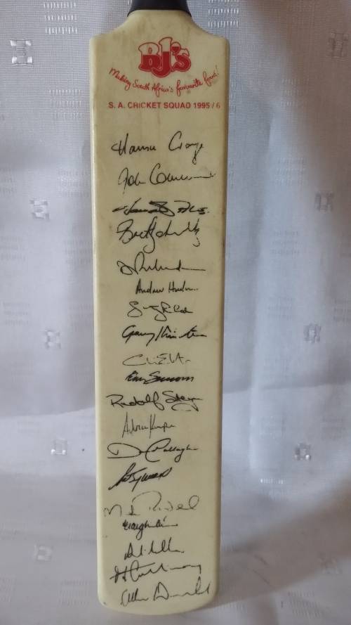 S. A CRICKET SQUAD 1995/6 SIGNED SMALL  BAT BY HANSIE CRONJE AND TEAM
