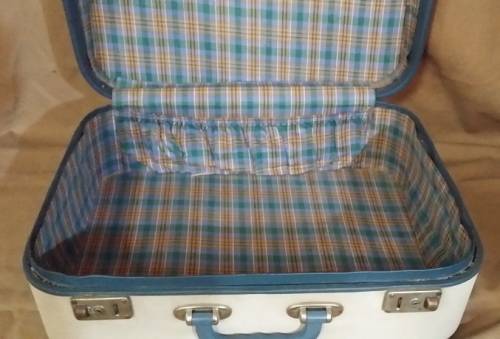A VINTAGE SUITCASE