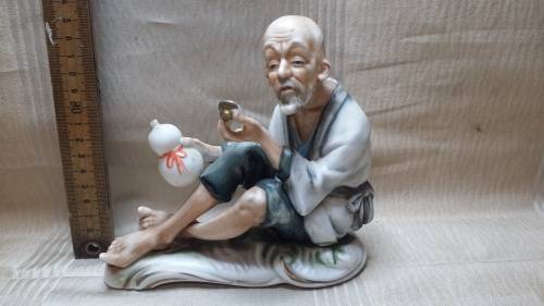MALE FIGURINE  ORNAMENT