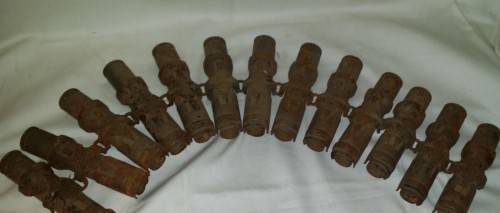 STRING OF SPEND MILITARY  CARTRIDGES