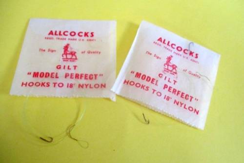 A lot vintage fishing tackle stuff in a rare very old "Players Navy Cut"  cigarette tin.