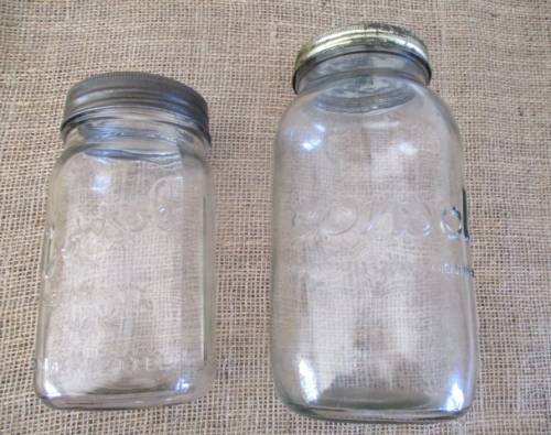Two Golden Oldies !!!!!  ...Two very old Consol glass preserve jars... One big and one medium size.