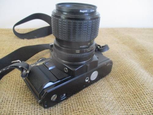 Vintage Black Body Minolta X-500 Camera With Sigma Zoom-Master 35 - 70mm Multi-Coated Lens
