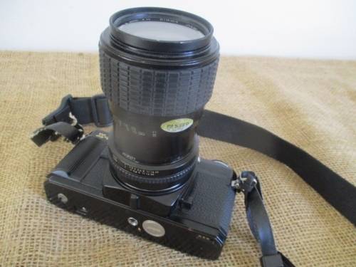 Vintage Black Body Minolta X-500 Camera With Sigma Zoom-Master 35 - 70mm Multi-Coated Lens