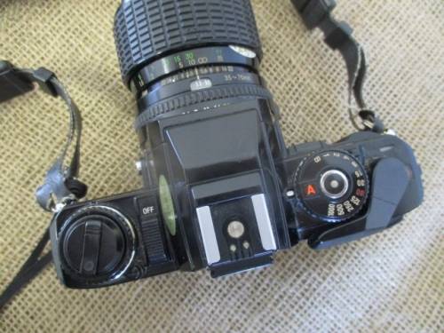 Vintage Black Body Minolta X-500 Camera With Sigma Zoom-Master 35 - 70mm Multi-Coated Lens