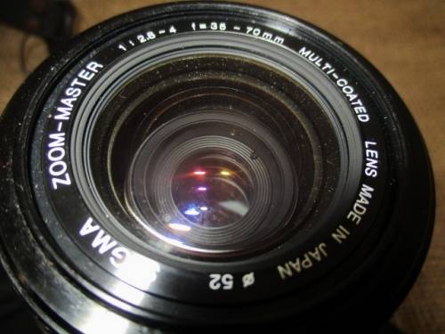 Vintage Black Body Minolta X-500 Camera With Sigma Zoom-Master 35 - 70mm Multi-Coated Lens