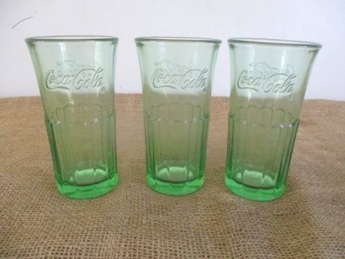 A Collection Of Three Collectable Coca Cola Glass Tumblers