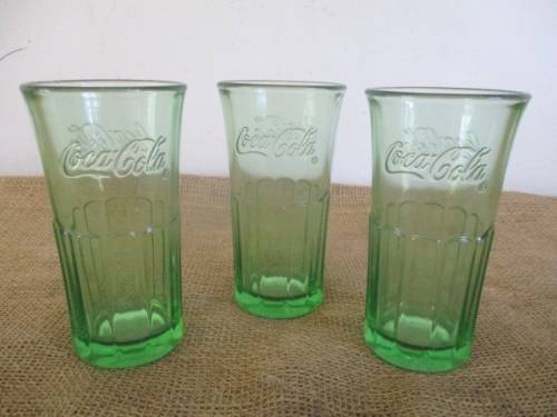 A Collection Of Three Collectable Coca Cola Glass Tumblers