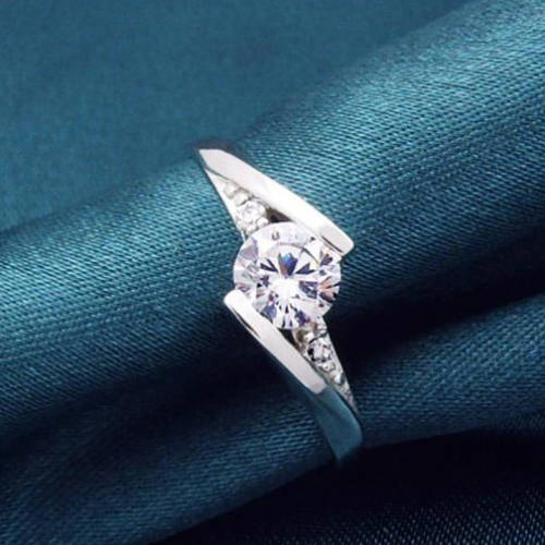 White zircon halo rhodium plated ring. Size 5, 6, 7, 8 (K, M, O, Q)