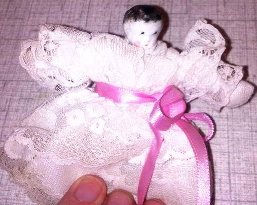 Very old small doll. About 8cm in size.