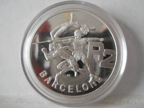 1992 BARCELONA R2 (CROWN) 1OZ SILVER. CONDITION AS PER SCAN. COIN IS IN CAPSULE AND BOX