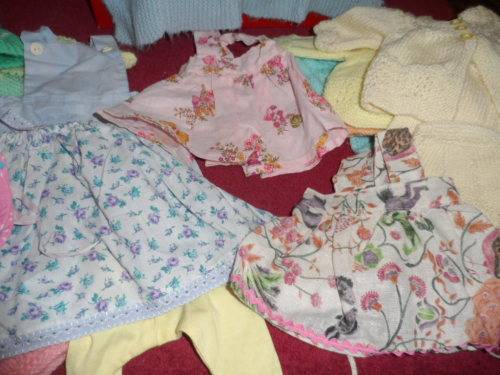 Lots of vintage first love dolls outfits