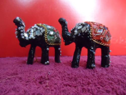 Small highly decorated elephants