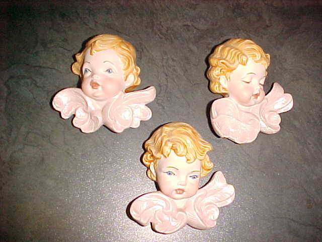 Three little angel faces