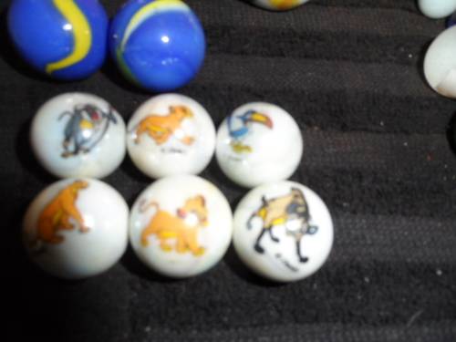 Huge Marble collection Ironies and glass and lion king small to large .  lovely collection