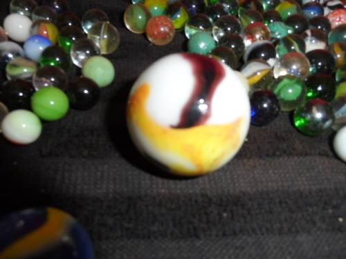 Huge Marble collection Ironies and glass and lion king small to large .  lovely collection