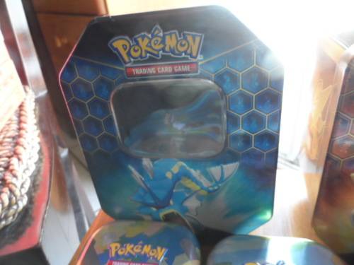 Beautiful pokemon tins look beautiful for cards 5 smaller and 2 larger all different