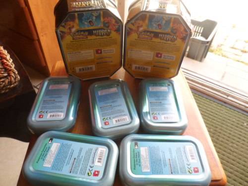 Beautiful pokemon tins look beautiful for cards 5 smaller and 2 larger all different