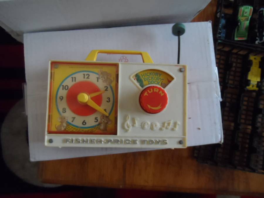 VINTAGE FISHER PRICE TOY BABIES CLOCK.