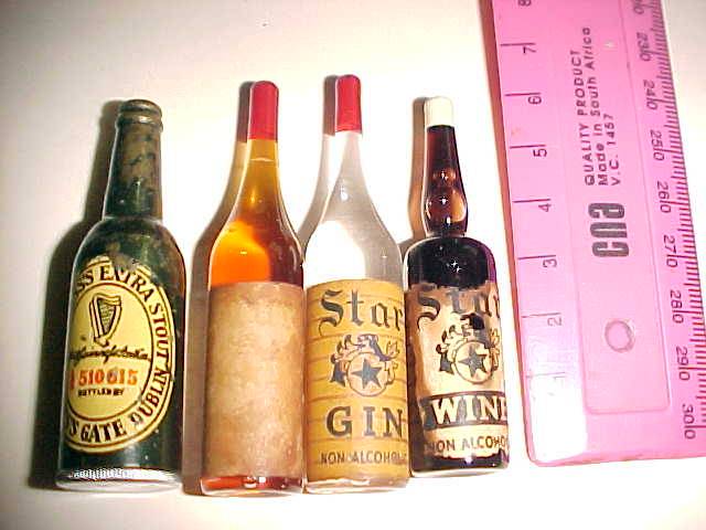 FOUR MINIATURE BOTTLES