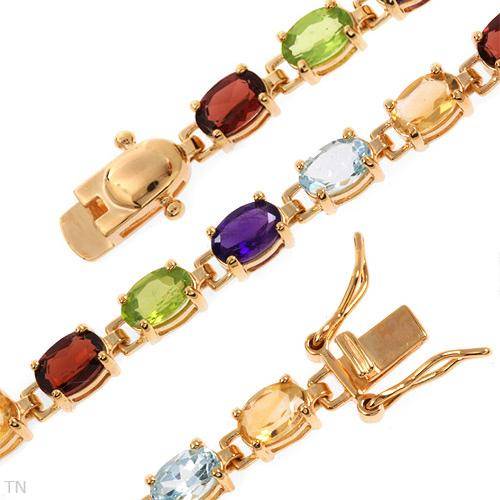 LOVELY TENNIS BRACELET IN Y/14K GOLD/925 SILVER WITH PRECIOUS GEMS.