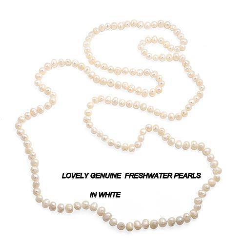 LOVELY GENUINE WHITE FRESHWATER PEARLS. 49inch.