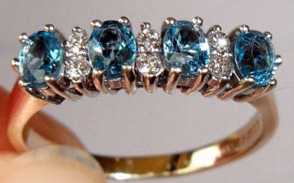 EXQUISITE!! 9CT GOLD RING WITH GENUINE BLUE TOPAZ & DIAMONDS. FULL BRITISH H/M. SIZE O-P