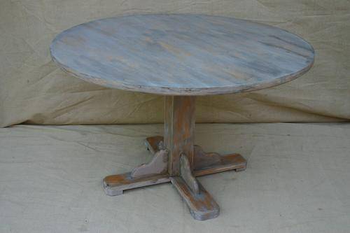 Round gray "white-wash" table