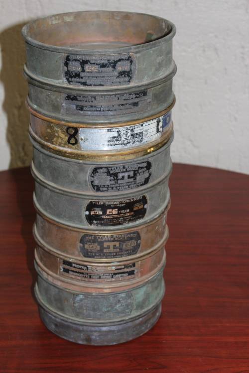 9 piece set of Copper and Brass Laboratory test sieves diameter 21cm height of stack 47cm