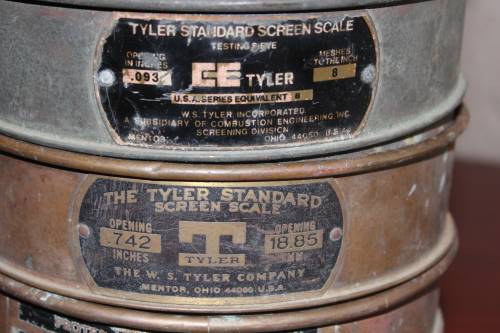 9 piece set of Copper and Brass Laboratory test sieves diameter 21cm height of stack 47cm