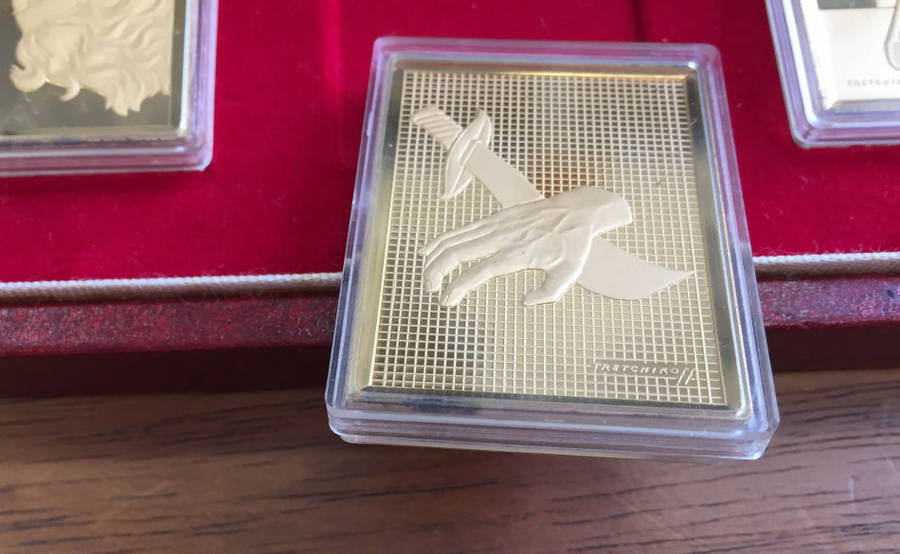 Ten Commandments by Tretchikoff precious metal medallion set. (Gold-plated sterling silver)