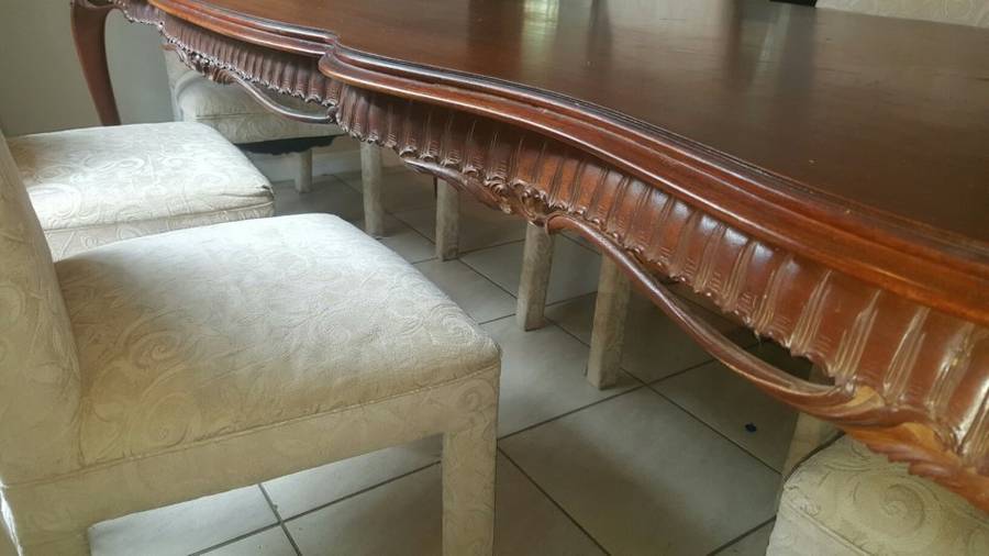 Beautiful Solid 8 Seater ornate Hand Carved Mahogany Dining Table with 6 Champagne Coricraft Chairs