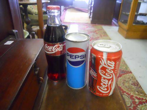 Shop keepers Coke bottle, pepsi and coke can all sealed and very collectable!!