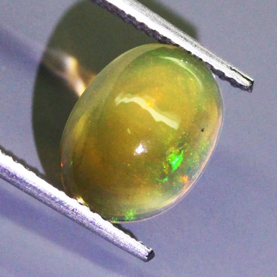 1.73Ct. Opal Oval Cabochon Multi  Colours Gem Ravishing Ethiopian Natural