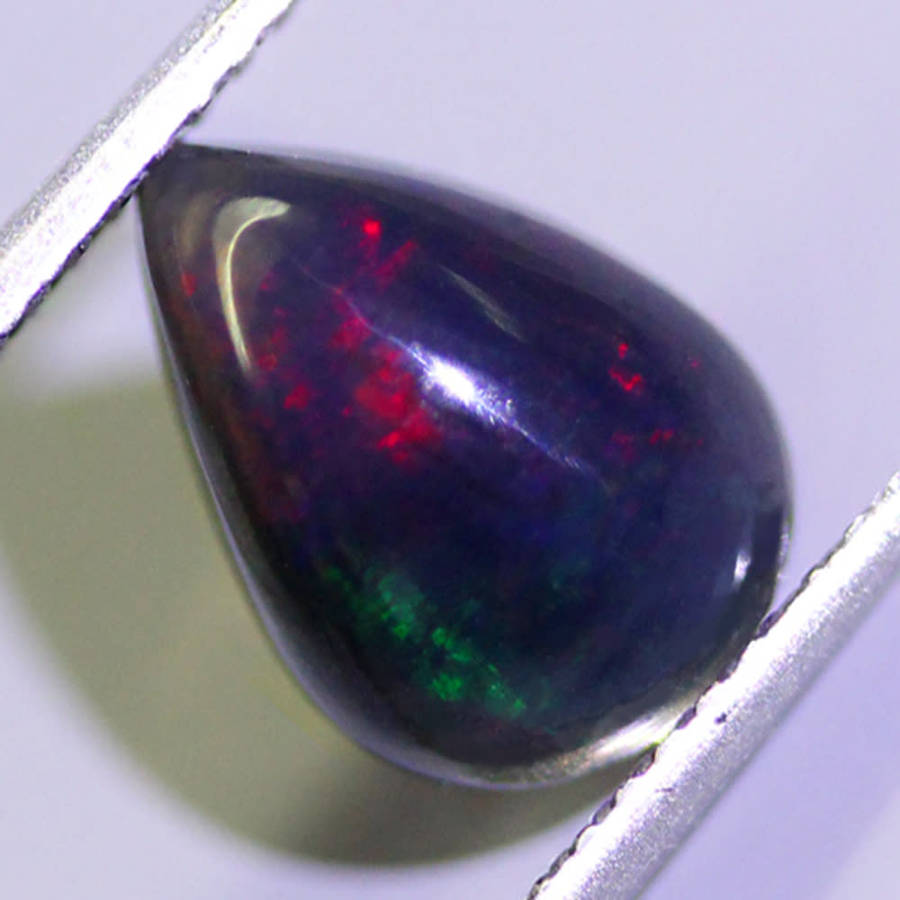1.26Ct.  Opal Pear Cabochon Multi Colours Glittering Rainbow 3D! Ethiopian Natural