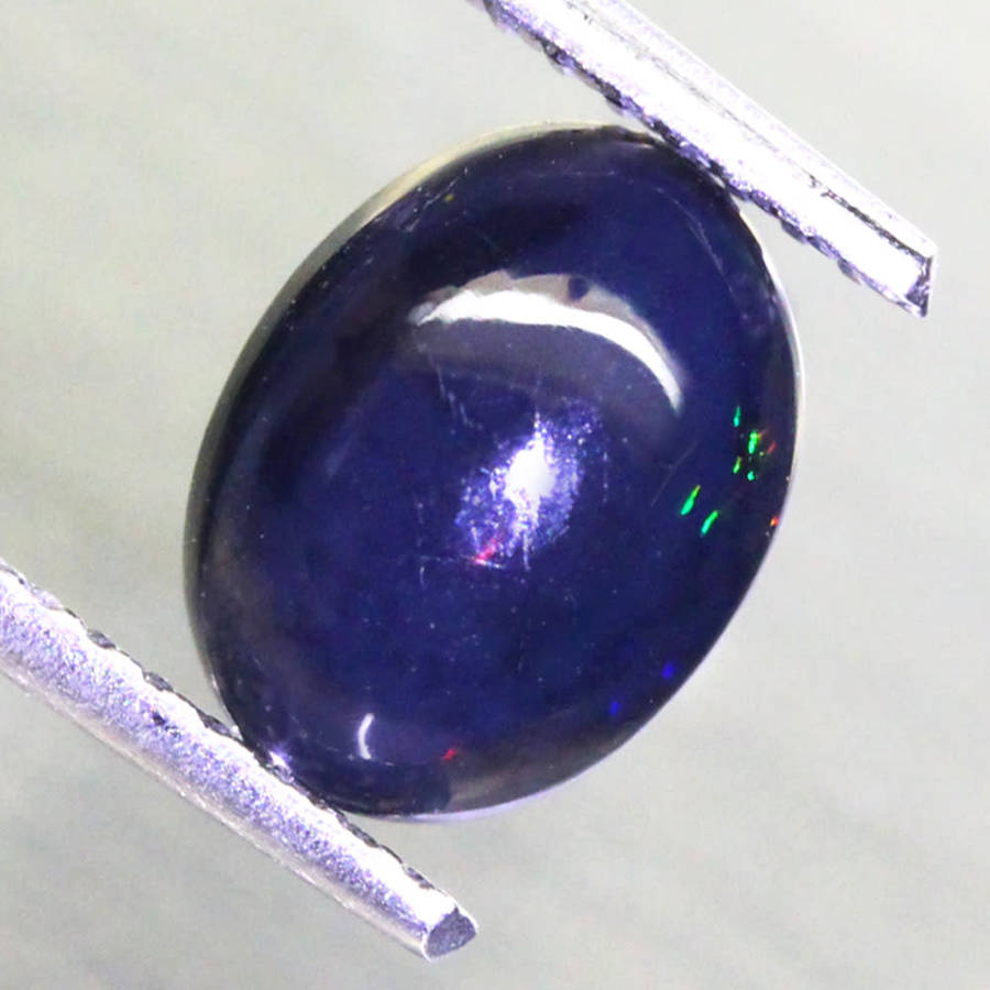 0.95Ct.  Opal Oval Cabochon Multi Colours Glittering Rainbow 3D! Ethiopian Natural