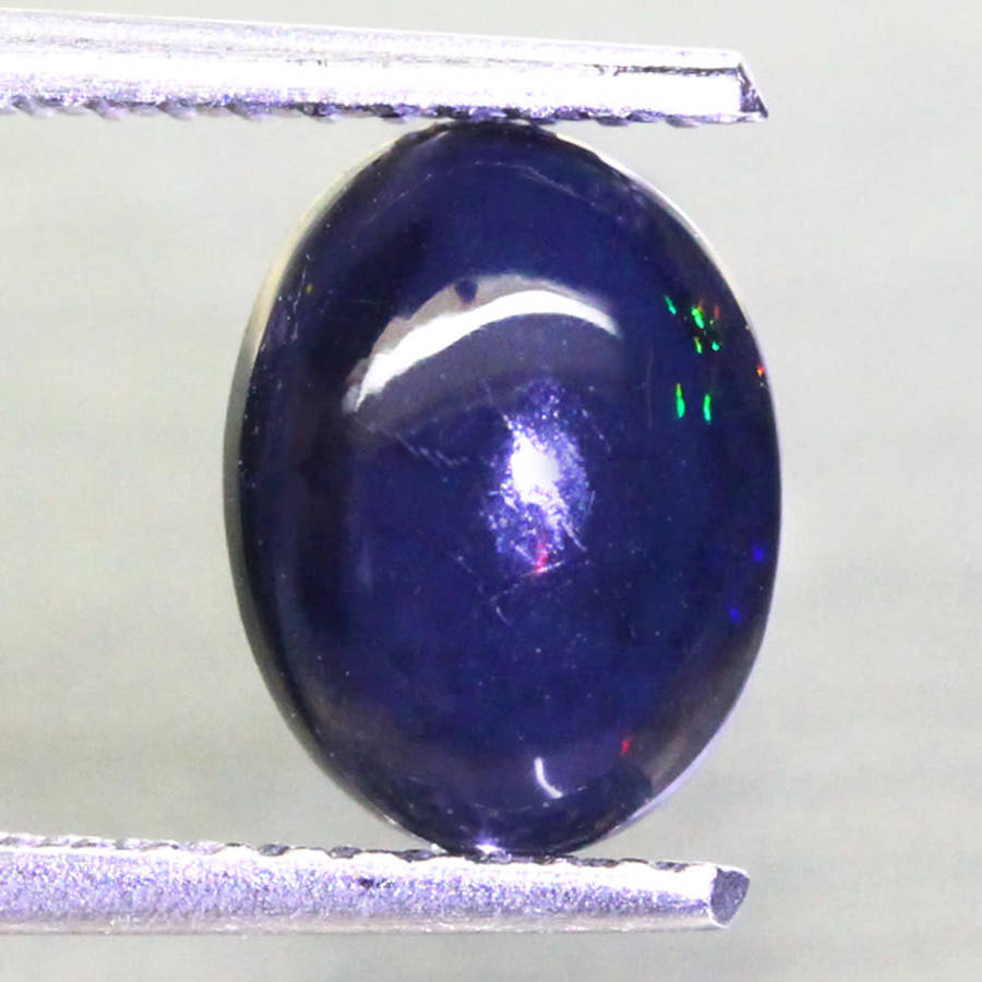0.95Ct.  Opal Oval Cabochon Multi Colours Glittering Rainbow 3D! Ethiopian Natural