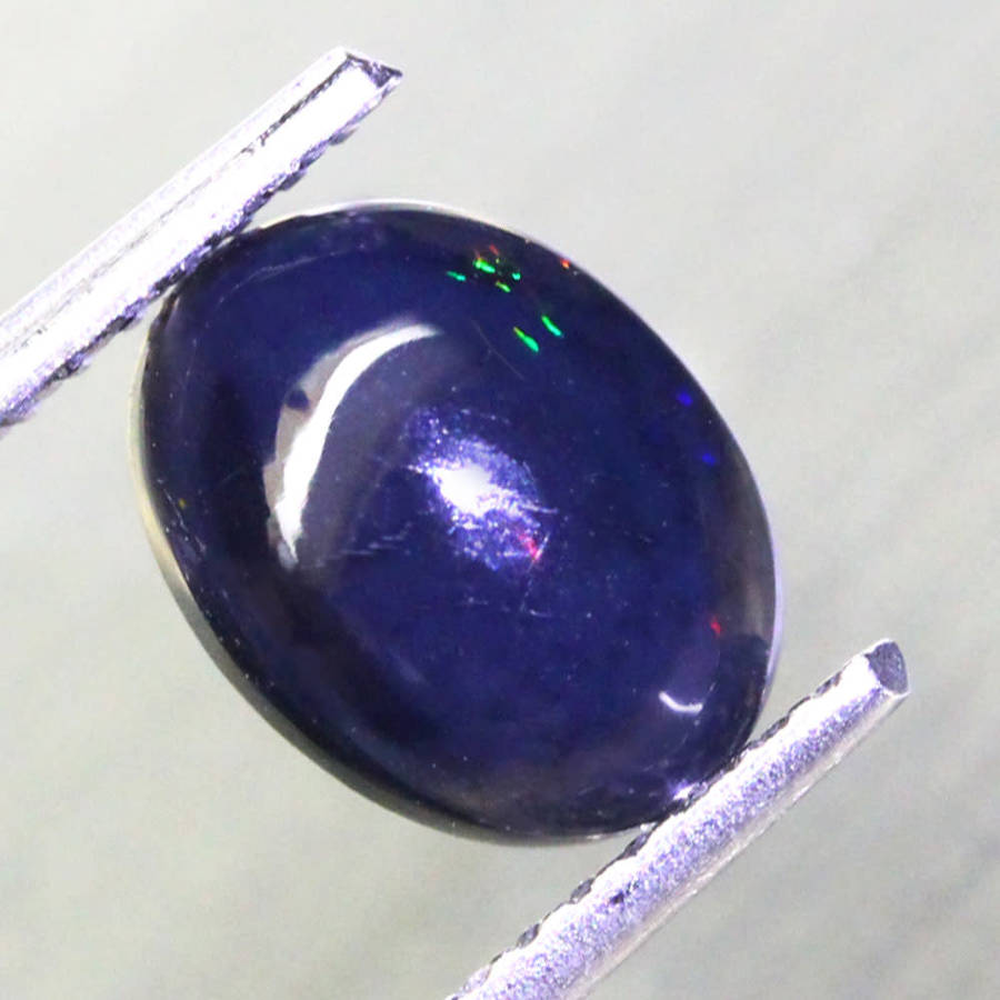 0.95Ct.  Opal Oval Cabochon Multi Colours Glittering Rainbow 3D! Ethiopian Natural