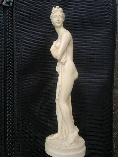 An A Santini sculpture of a lady with beautiful detail