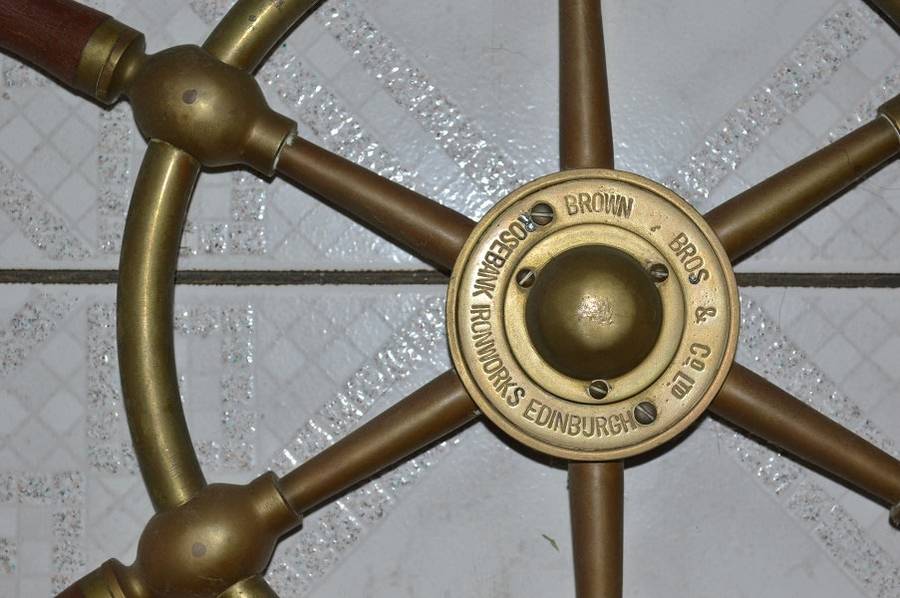 A brass ships wheel marked Brown Brothers & Co. Ltd, Rosebank Iron Works Edinburgh