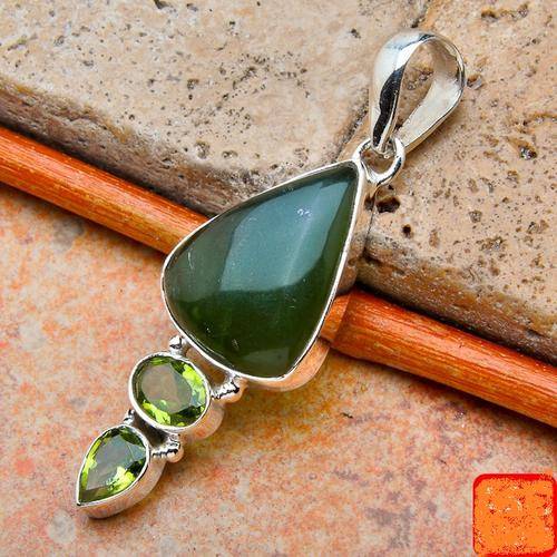 Exquisite Solid Silver Ruby Ziosite and Peridot Pendant...