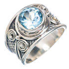 Gorgeous Solid Silver and Blue Topaz size 7 ring
