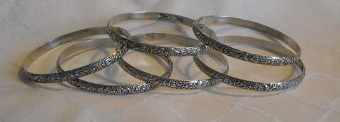 SIX CANDIDA STERLING SILVER BANGLES